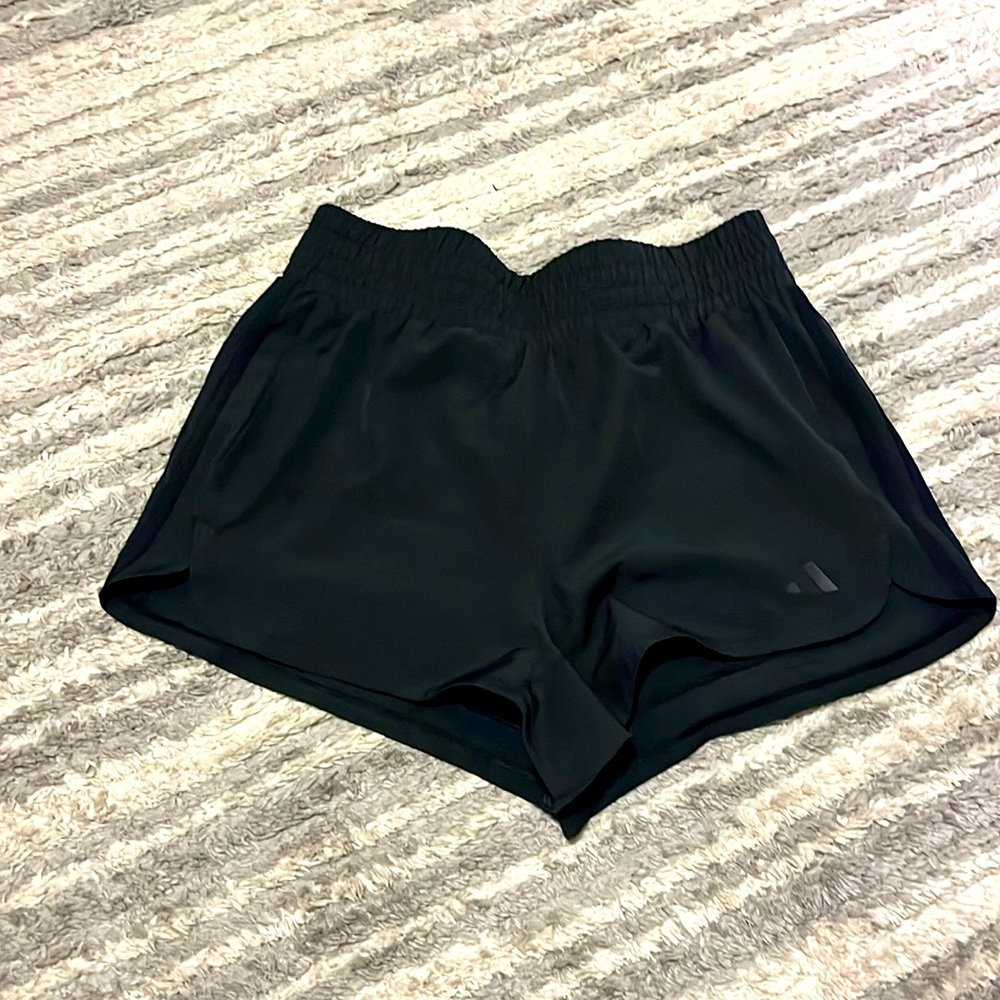 Adidas black athletic shorts, size M.